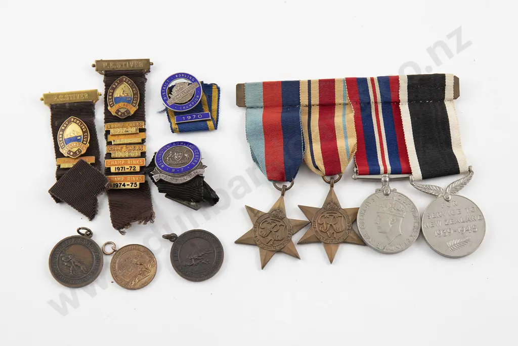 Assorted medals and badges Image 1++