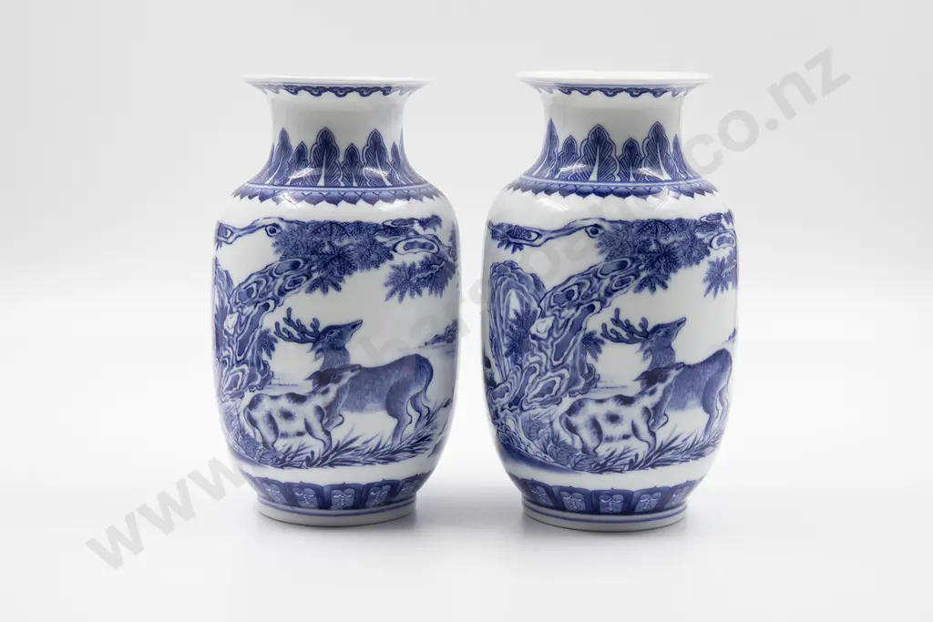 A pair of Chinese Blue and White Porcelain vases Image 1++