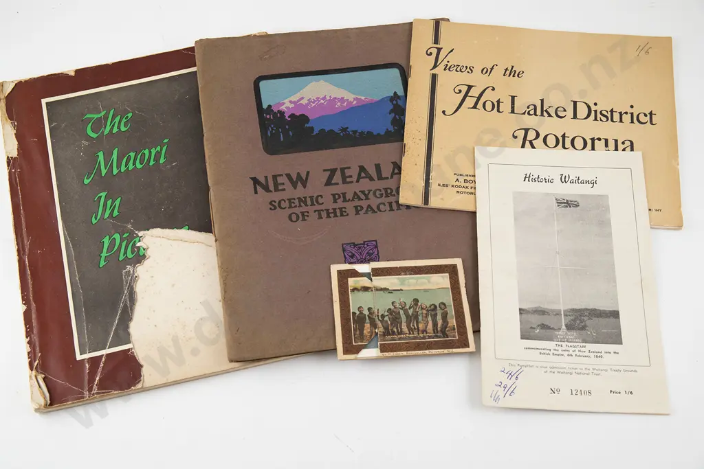 Albumen photograph depicting Bella Papakura together with a collection of other photo cards and books Image 1++