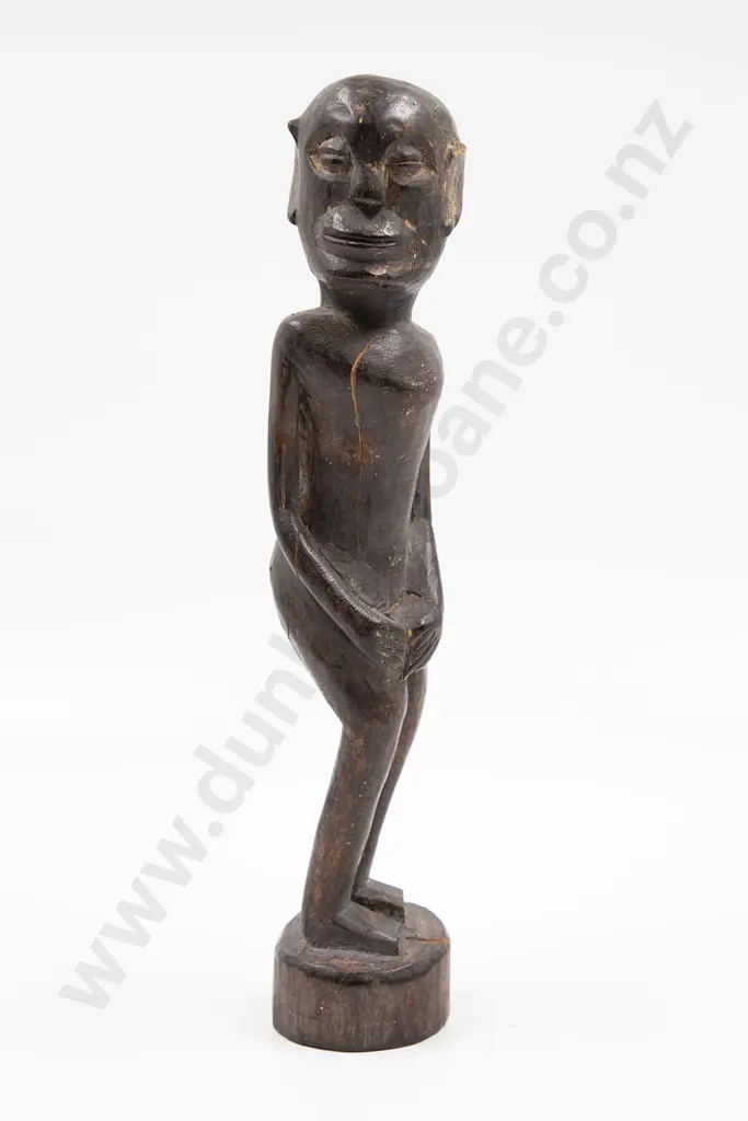 Carved Indonesian Figure Image 1++