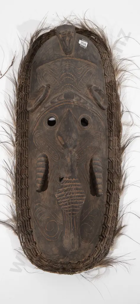 Two Papua New Guinea masks Image 1++