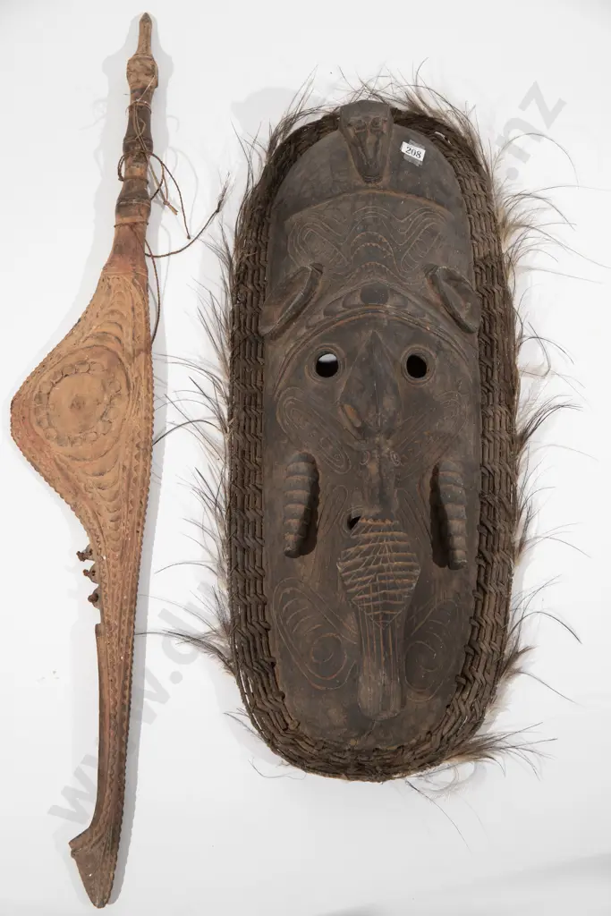 Two Papua New Guinea masks Image 1++