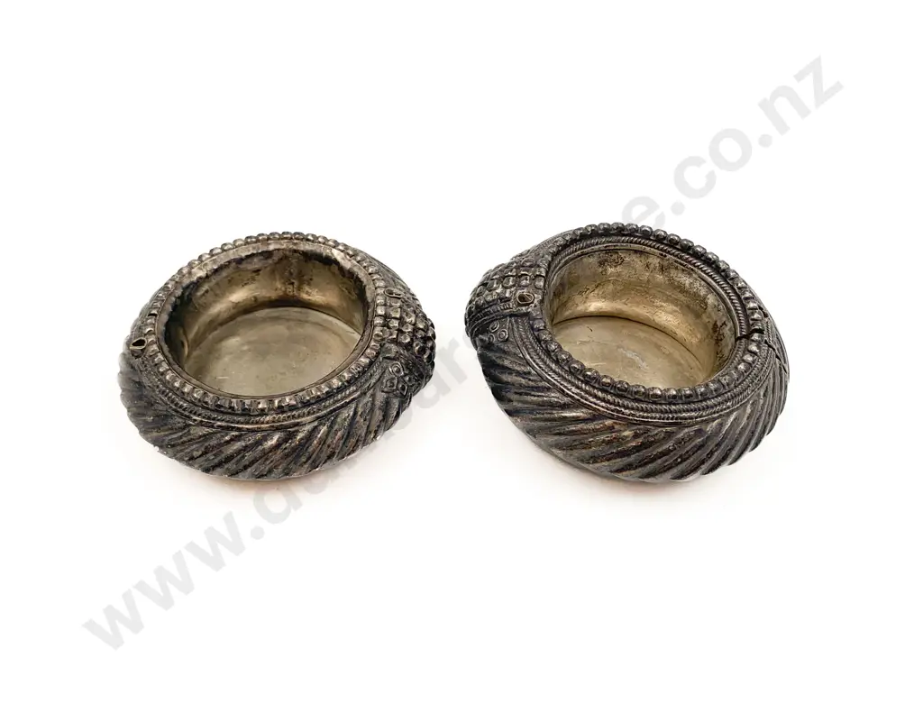 Two African Silver Bracelets as Dishes Image 1++
