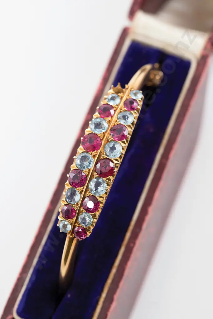 NZ Colonial 18ct 20stone Ruby and Aquamarine Hinged Snap Bangle Image 1++