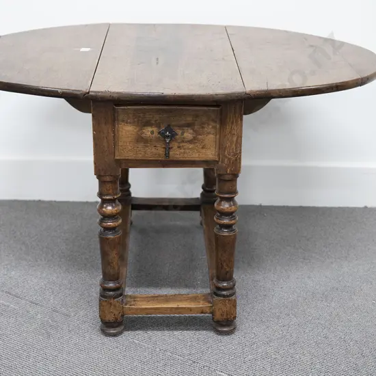 Small Early C18th French Provincial Walnut Oval Drop Leaf Table