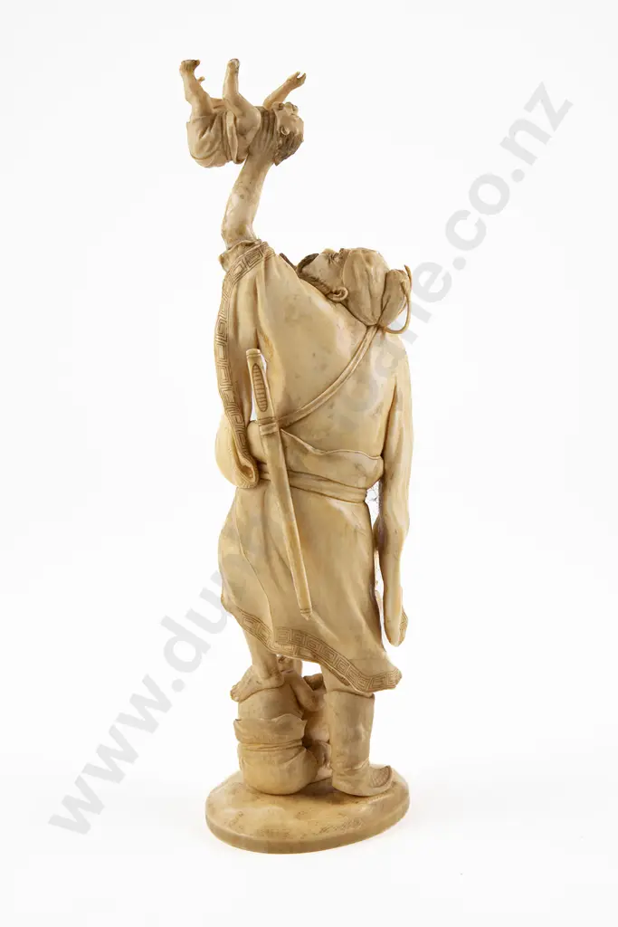 A Japanese Meiji Period Ivory figure of a Bearded Sennin in Battle with Three Oni Image 1++