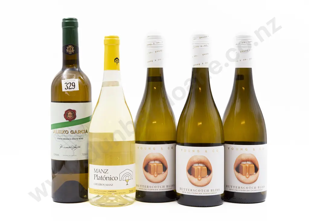 Five Bottles of Assorted Portuguese and American White Wine Image 1++