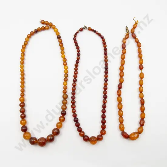 Three Various Single Strand Amber Bead Necklaces