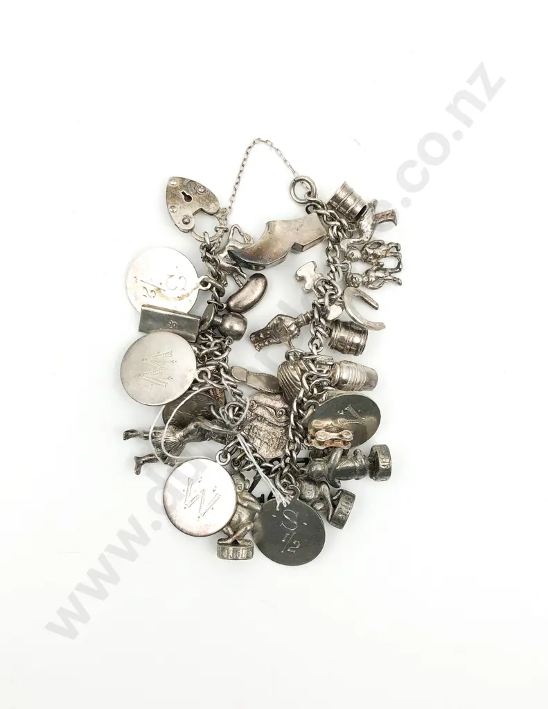 Silver Plate Curb Link Charm Bracelet with 31 mainly s/s charms Image 1++