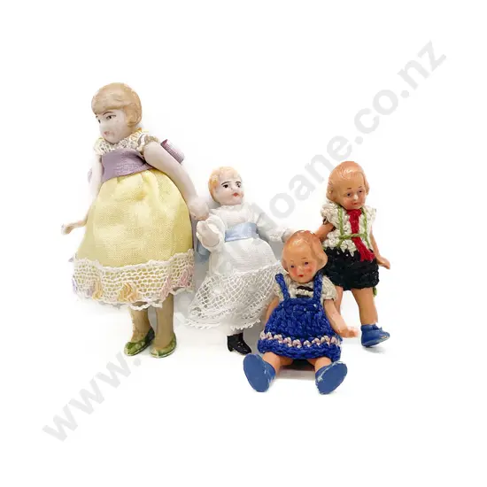 Four Tiny All Bisque Dolls