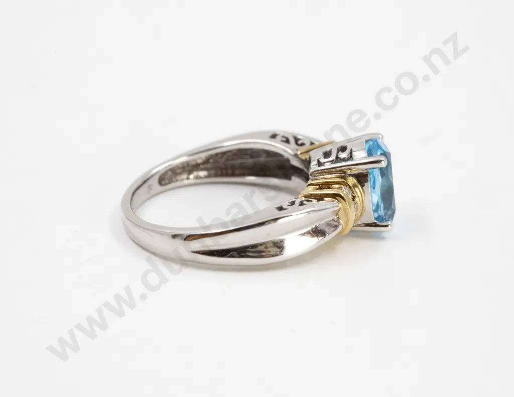 10ct White Gold Blue Topaz and Diamond Dress Ring Image 1++