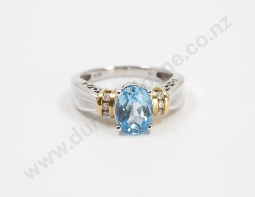 10ct White Gold Blue Topaz and Diamond Dress Ring Image 1++