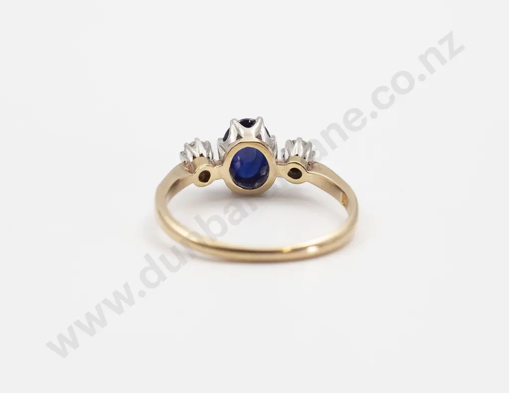 18ct Three Stone Sapphire and Diamond Bridge Ring Image 1++