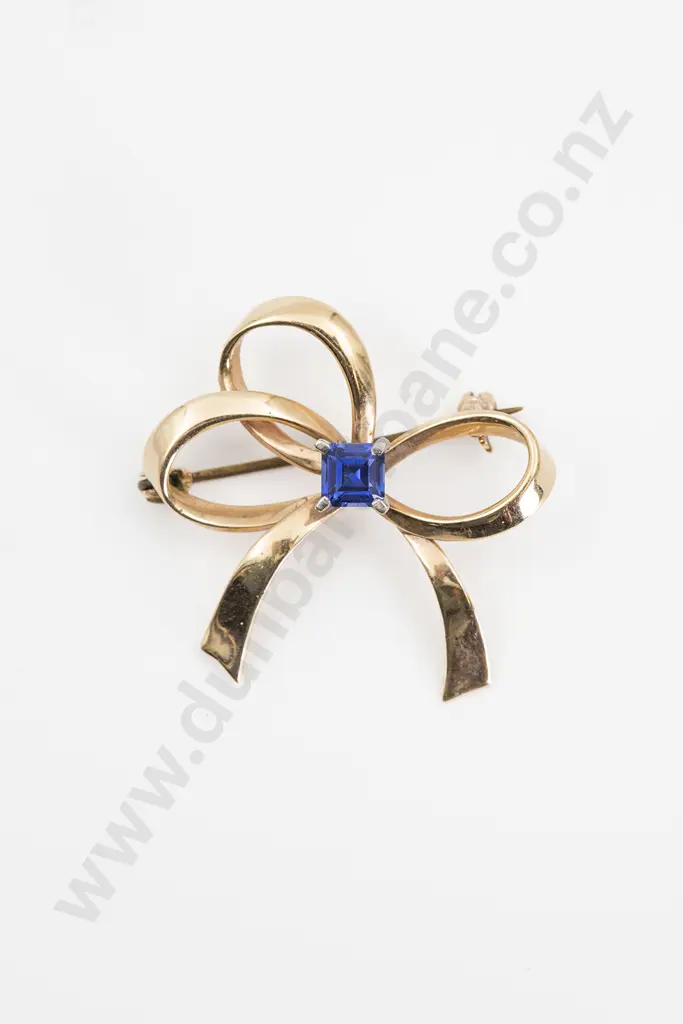 9ct Single Sapphire Bow Brooch Image 1++