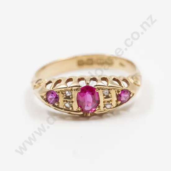 Edwardian 18ct Seven Stone Synthetic Ruby and Diamond Chip Bridge Ring