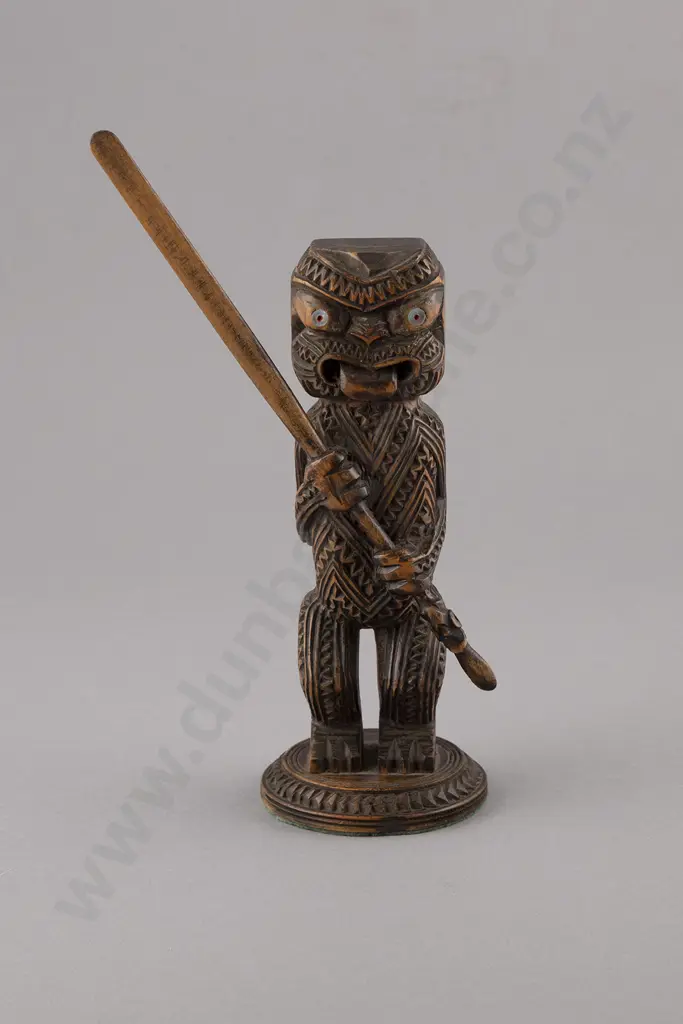 Carved Tekoteko Figure Holding Taiaha Image 1++