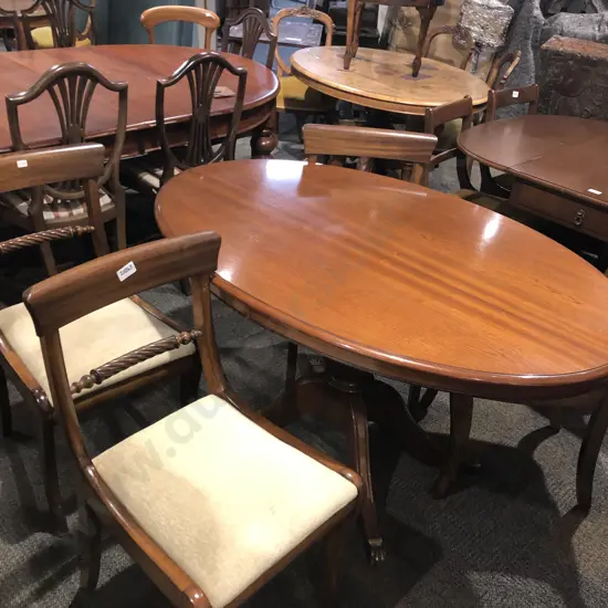 Mahogany Oval Dining Table Together with Four Dining Chairs