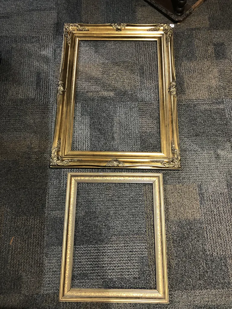Two Empty Gilt Frames Image 1++