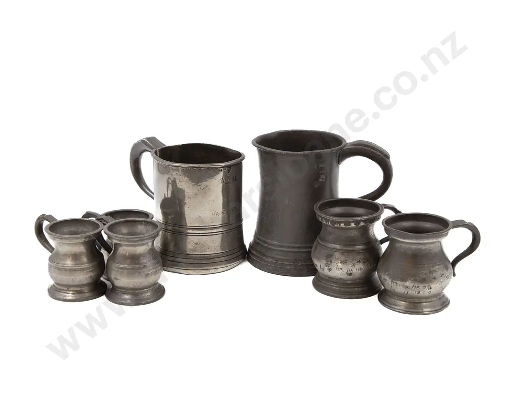 Seven Small Pewter Tankards Image 1++