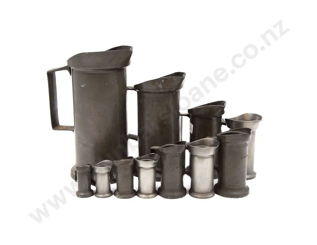 11 Graduated Pewter Measures Image 1++