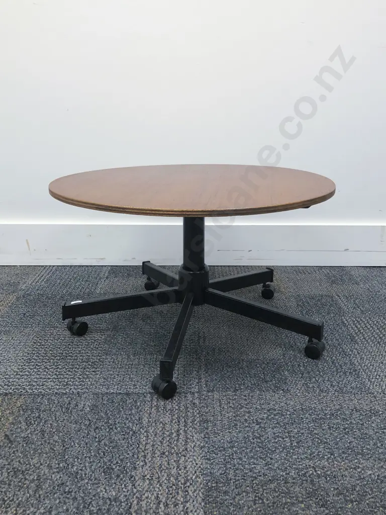 Circular Occasional Table on Casters Image 1++