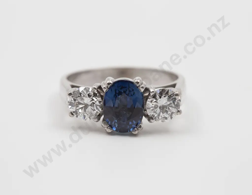 18ct White Gold Three Stone Sapphire and Diamond Bridge Ring Image 1++