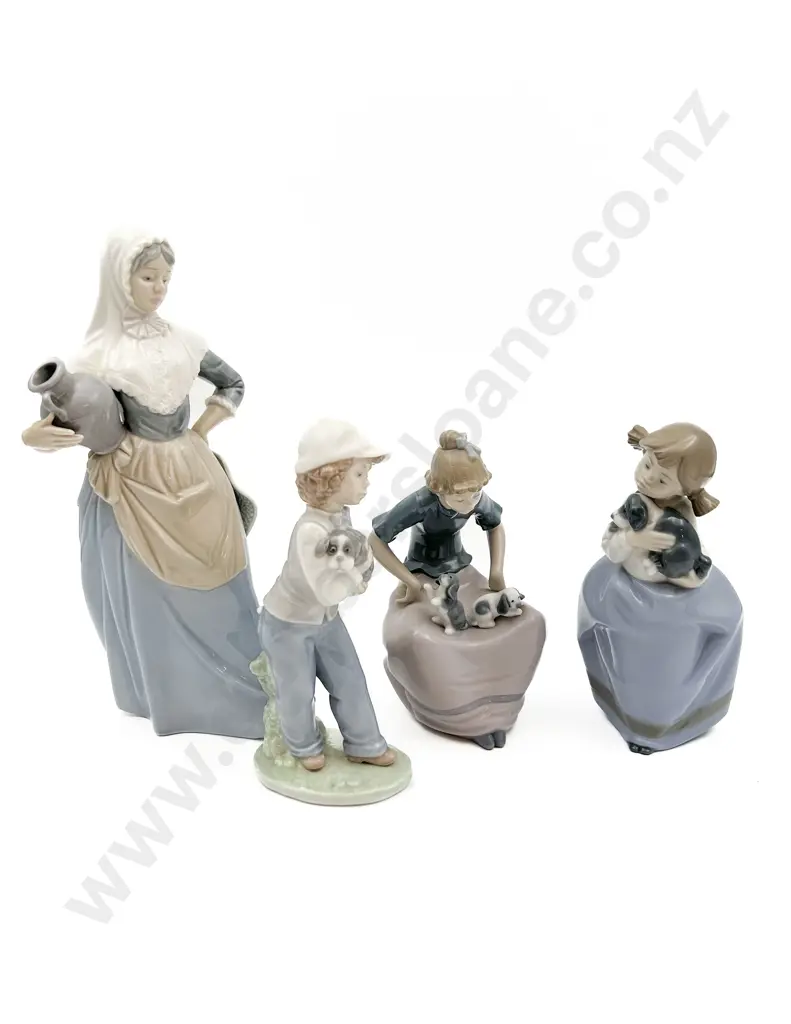 Four Assorted Nao Figures Image 1++
