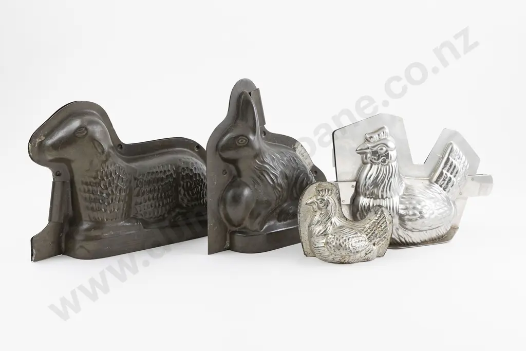 Four Tin Chocolate Moulds Image 1++