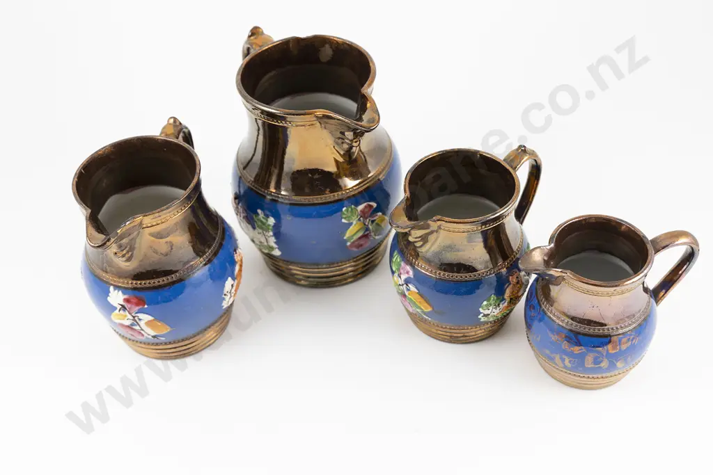 Late Victorian Graduated Set of Four Copper Lustre Jugs Image 1++