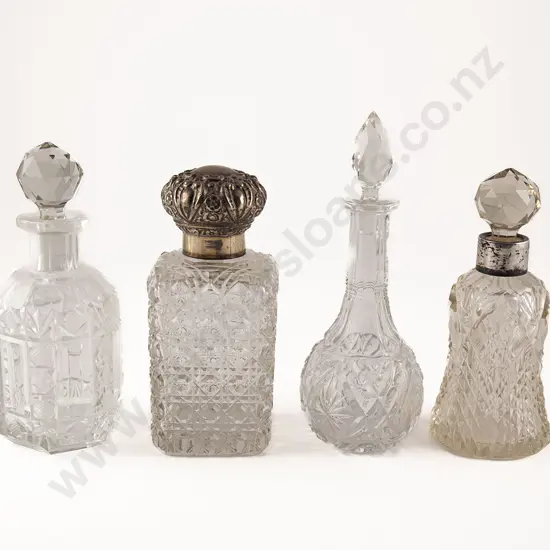 Four Victorian Clear Glass Scent Bottles