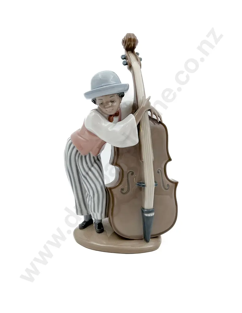 Lladro Figure of Boy Playing Bass Image 1++