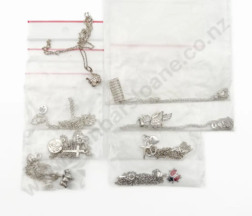 Eight Assorted S/S Charms on Chain Image 1++