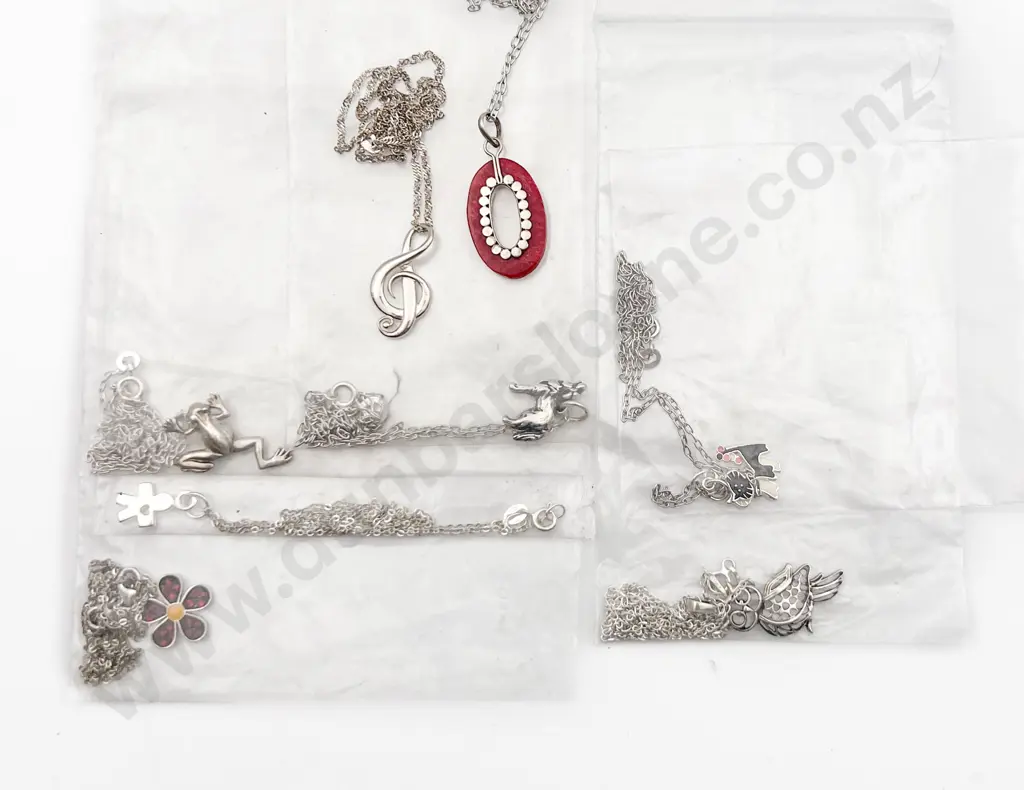 Eight Assorted S/S Charms on Chain Image 1++