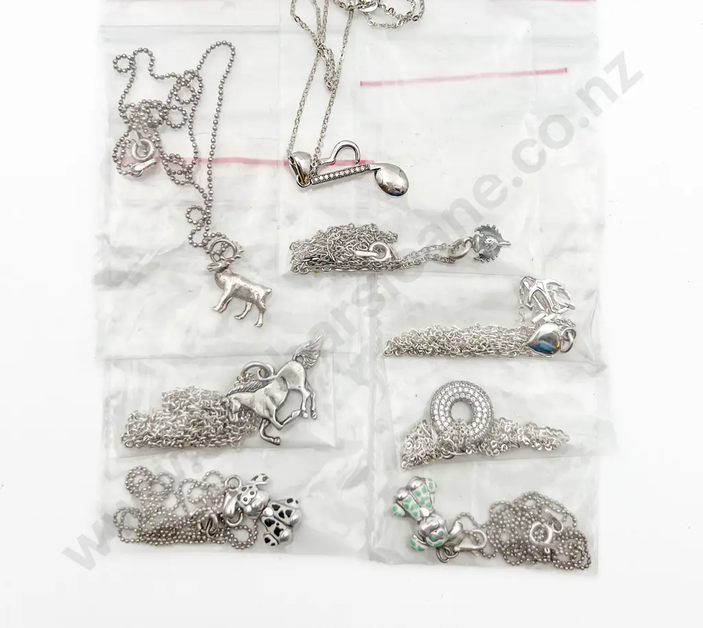 Eight Assorted S/S Charms on Chain Image 1++