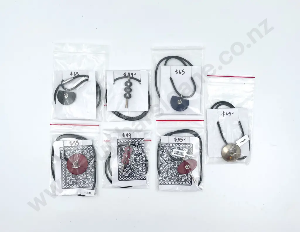 Eight Pendants on Leather Chains Image 1++