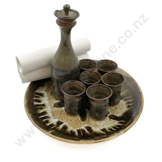 Pottery Decanter and Six Cups Together with Pottery Charger and Two Loose Prints