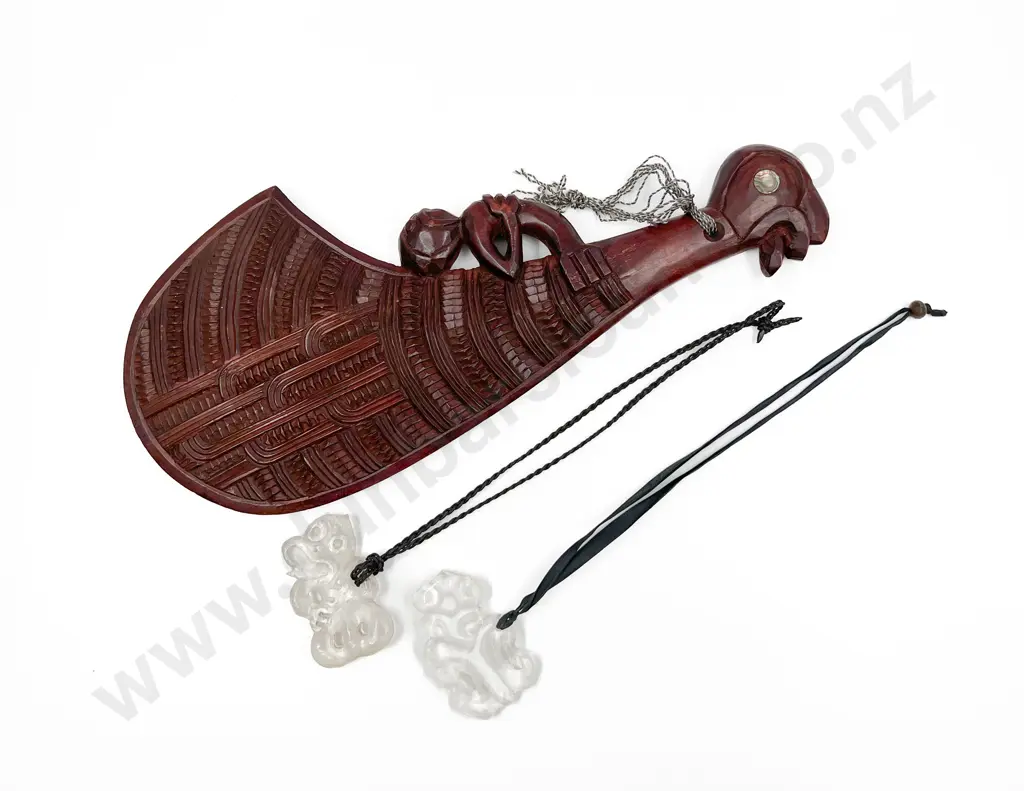 Wooden Patu Ornament Together With Two Plastic Tiki Pendants Image 1++
