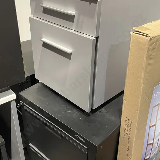 Three Filing Cabinets