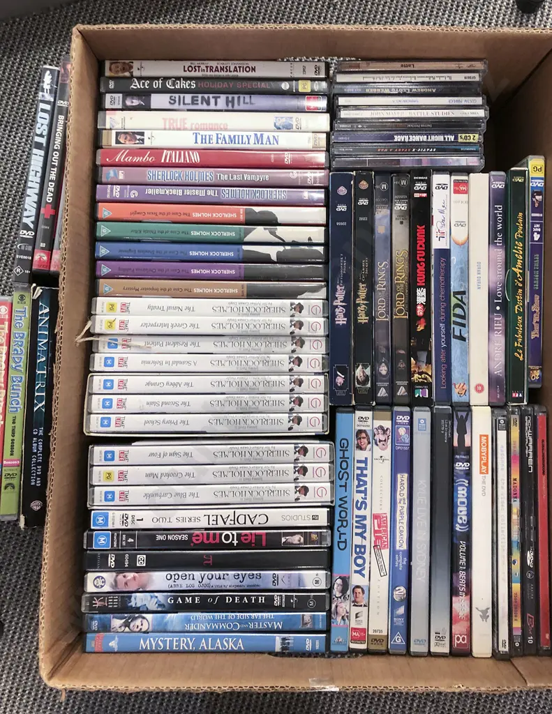 Box of Assorted DVDs Image 1++