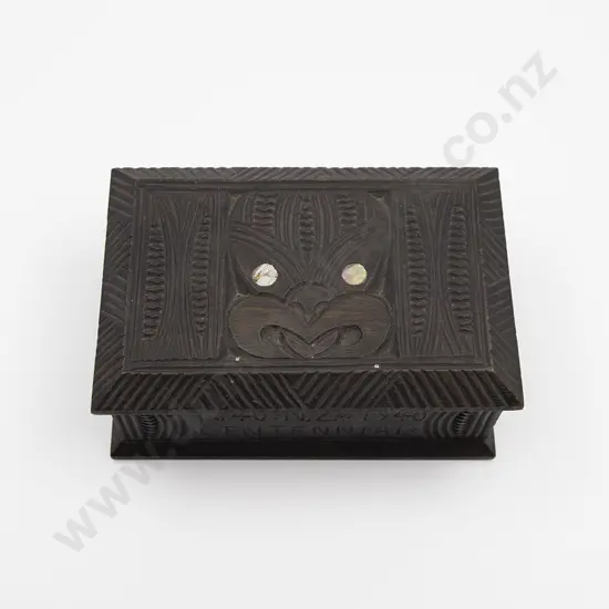 Inscribed Ebonised Carved Lidded Box With Whekku Head