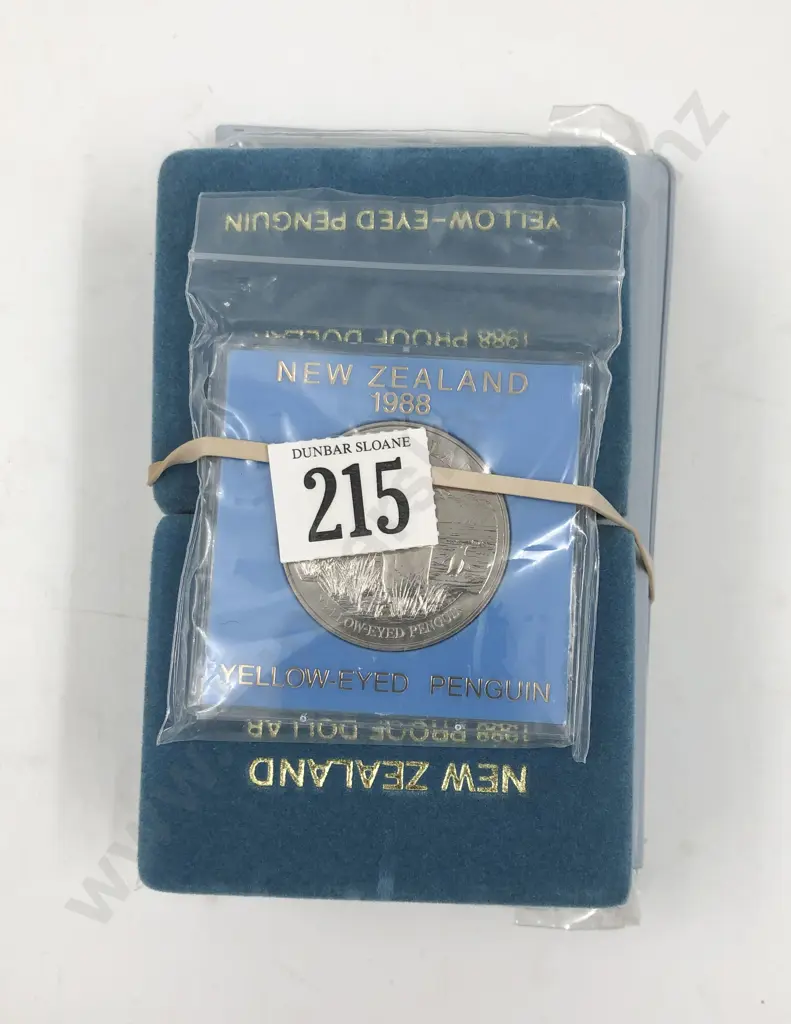Two NZ 1988 Coin Sets Together with Three 1988 Yellow Eyed Penguin Proof Dollars Image 1++