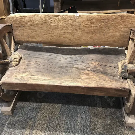 Vintage Natural Form Bench with Wagon Wheel Supports