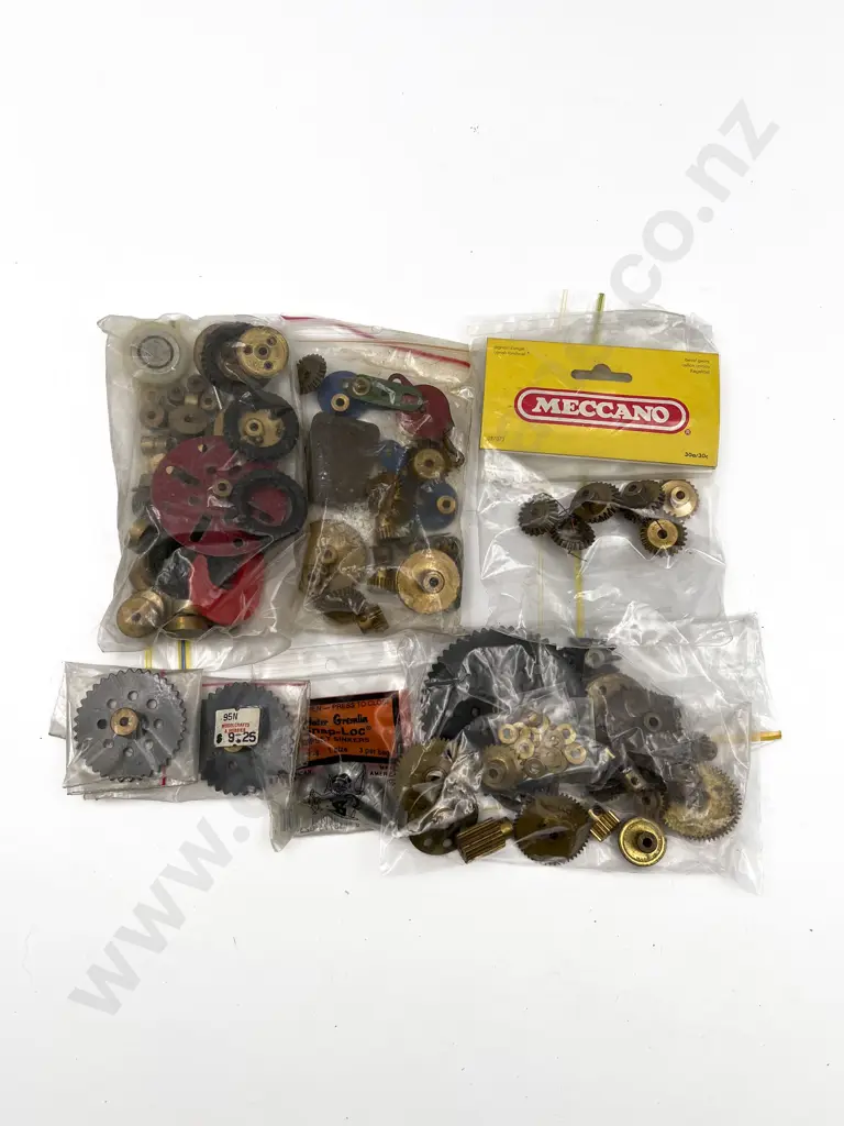 Qty Meccano Assorted Gears and Four Electric Motors Image 1++