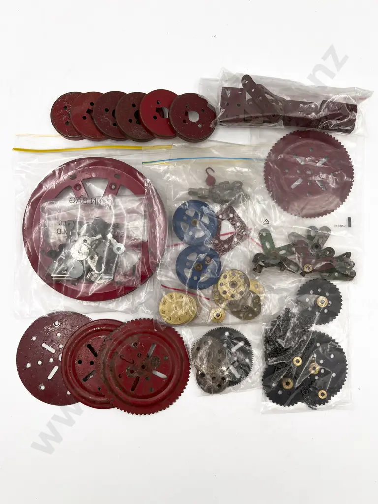 Meccano Assorted with Pulleys Plates and Gears in red Image 1++