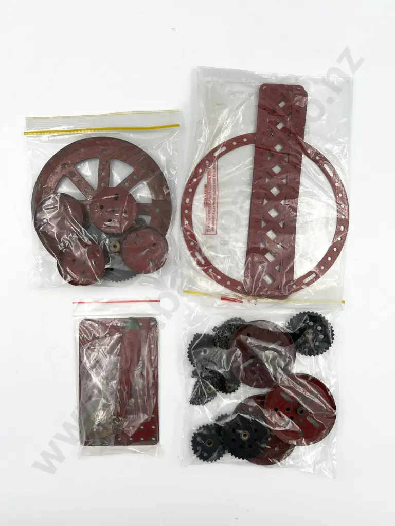 Meccano Assorted with Pulleys Plates and Gears in red Image 1++