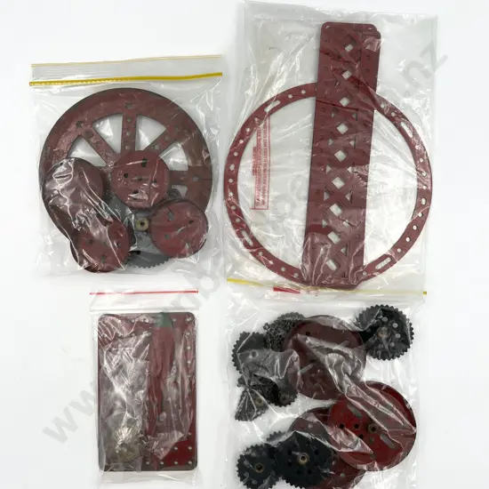 Meccano Assorted with Pulleys Plates and Gears in red