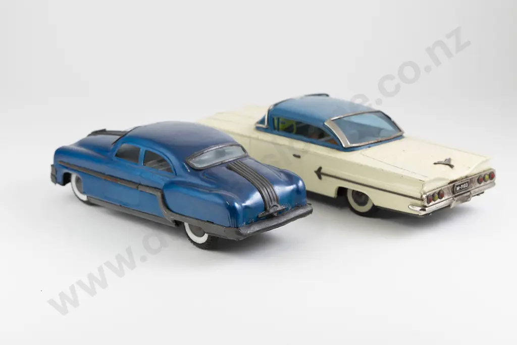 San Mark Cadillac and Unmarked Sedan Image 1++