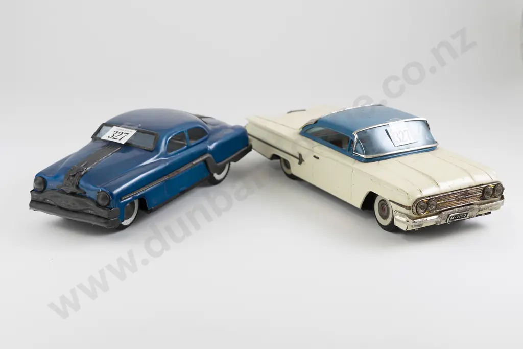 San Mark Cadillac and Unmarked Sedan Image 1++