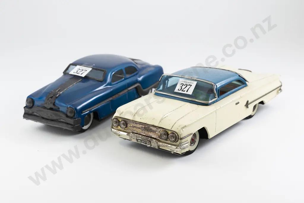 San Mark Cadillac and Unmarked Sedan Image 1++