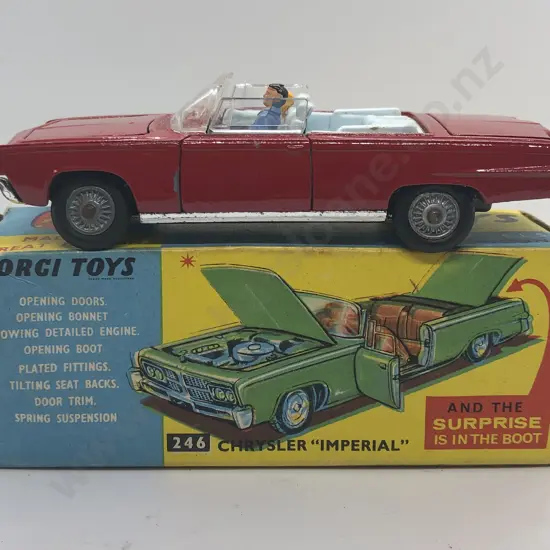 Boxed Corgi 246 Chrysler 'Imperial" complete with golf clubs